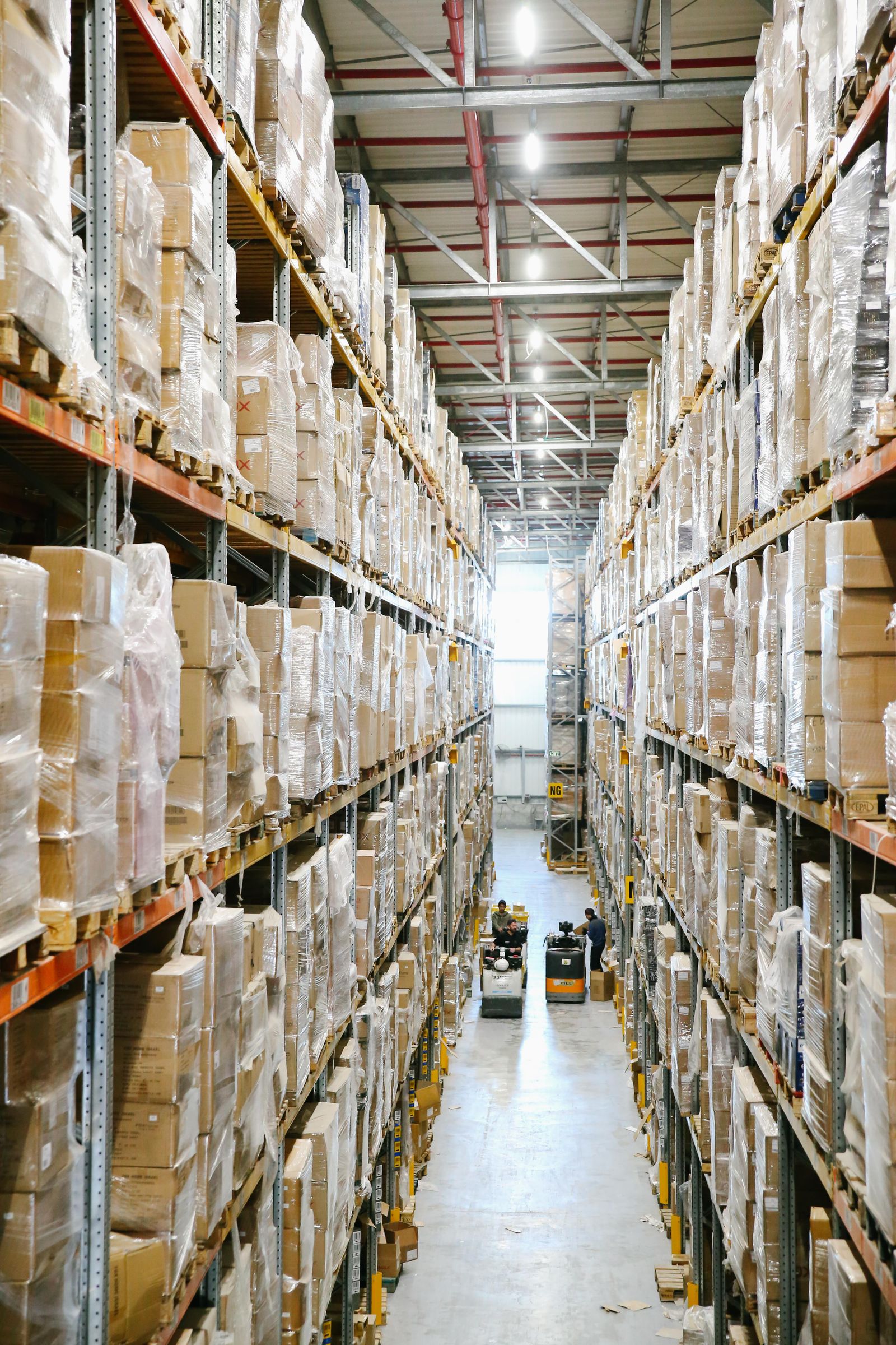 Warehouse aisle lined with stock